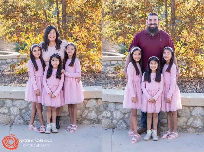 Extended family smiling together under the Pasadena Bridge, dressed in pink and maroon tones.

